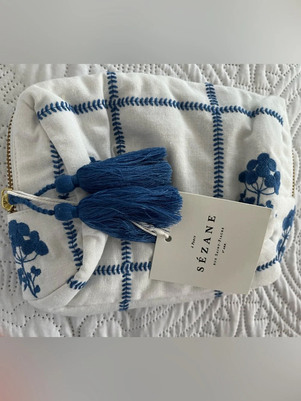 Sezane white and blue embroidery zip makeup bag